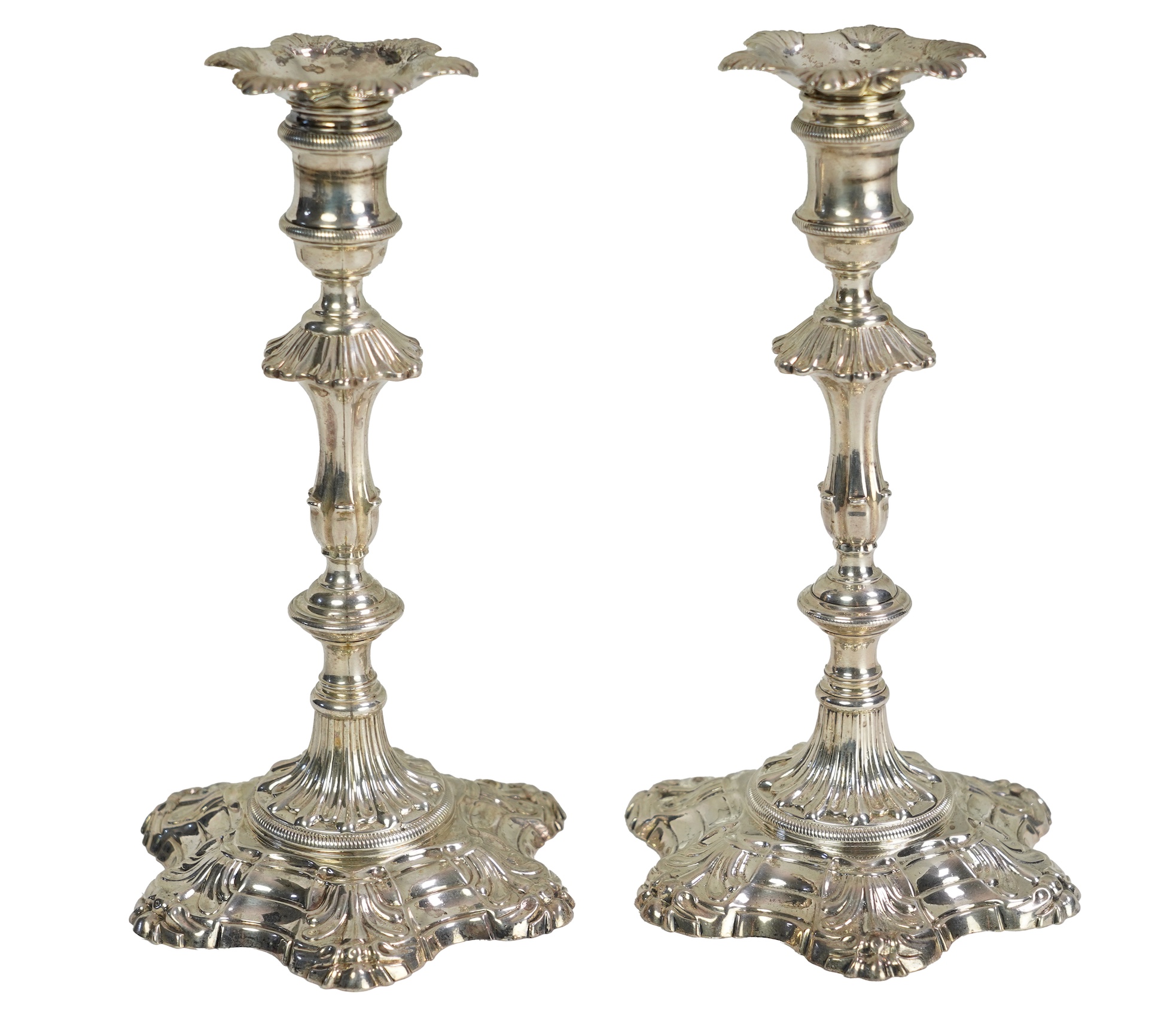 A pair of George II silver candlesticks by John Quantock